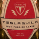 Imagen para el artículo titulado La última idea de Elon Musk es patentar una bebida llamada Teslaquila, y los productores de tequila no están contentos